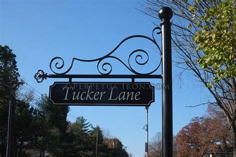 wrought iron sign post